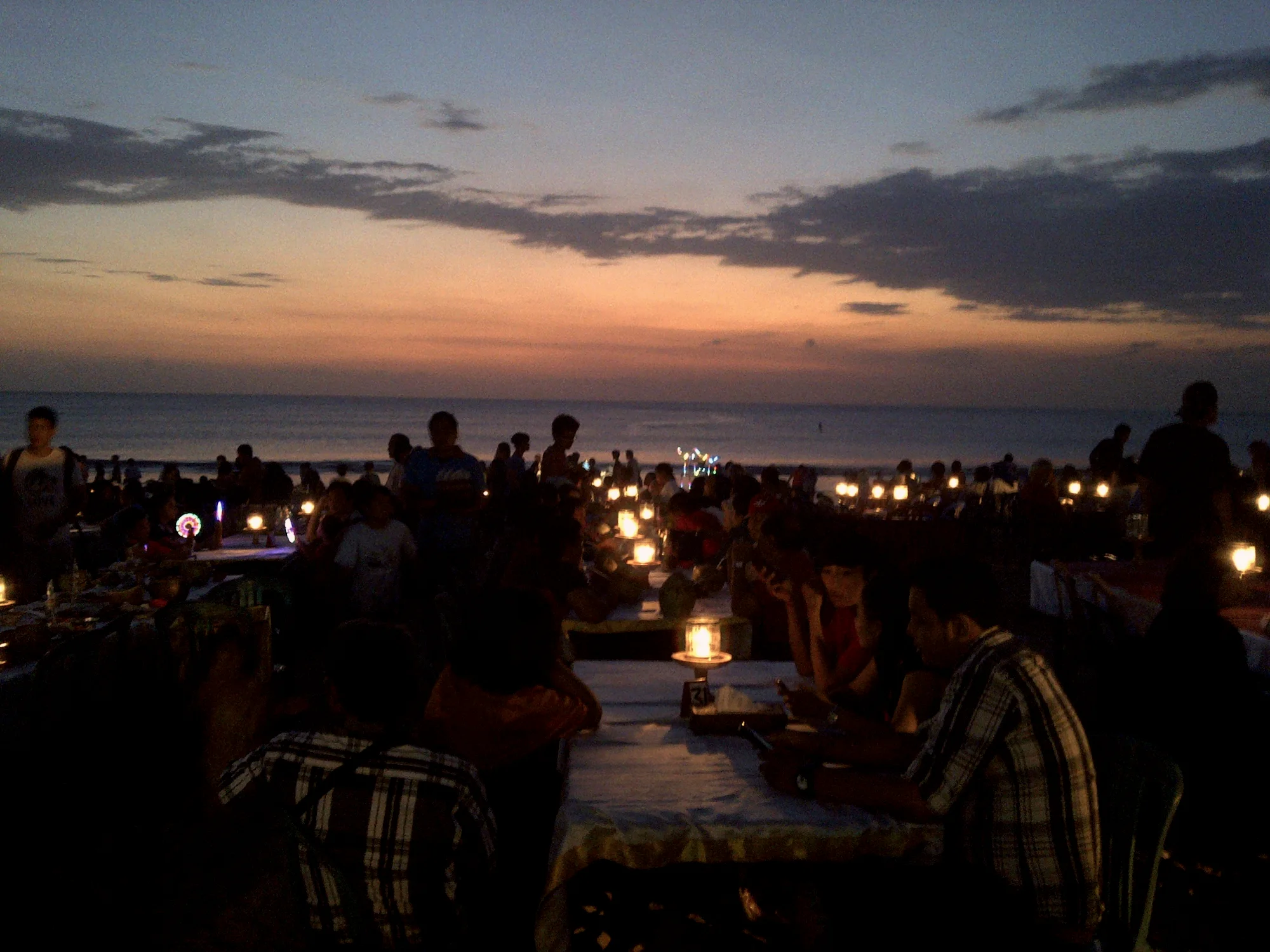 Seafood dinners on the sand at Jimbaran at dusk