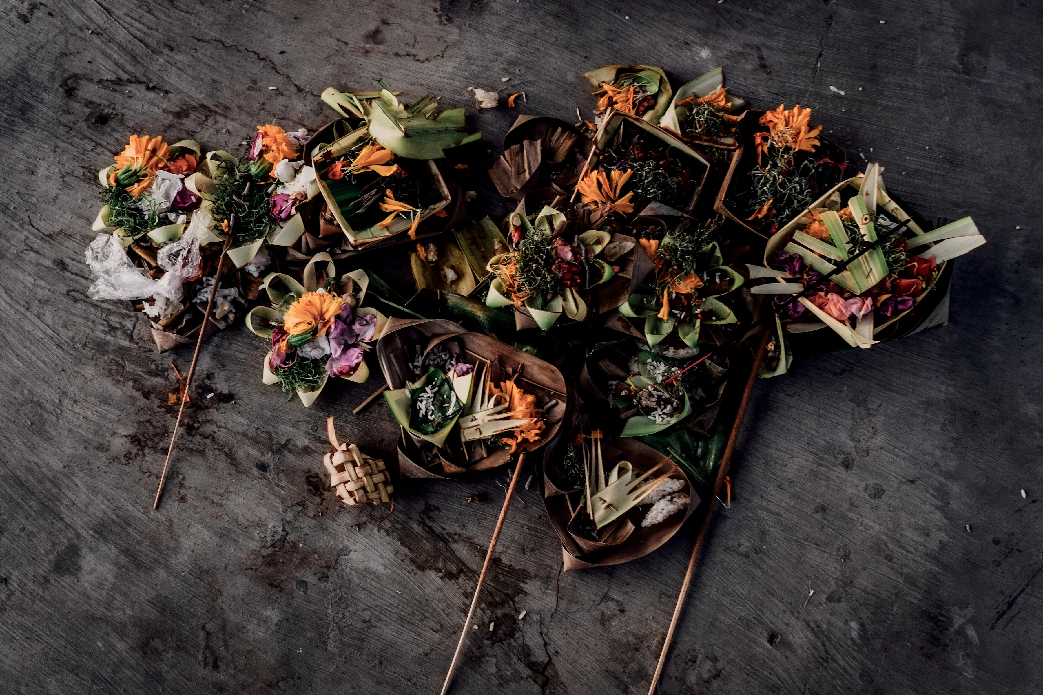 Canang sari offerings on a Seminyak pavement