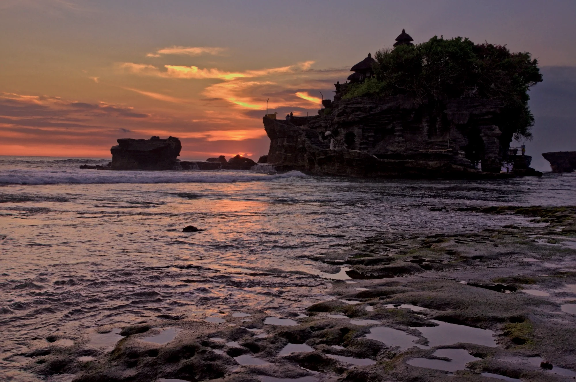 Tanah Lot temple on its rock at sunset