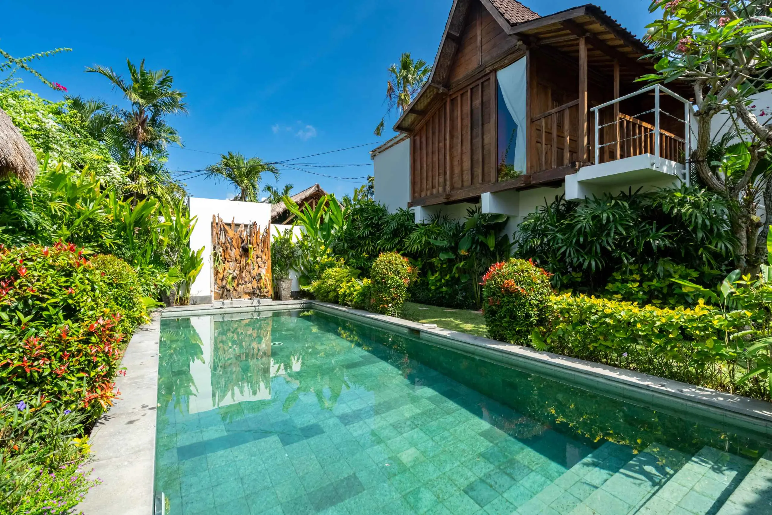 The garden and pool at Villa Aniri, Seminyak